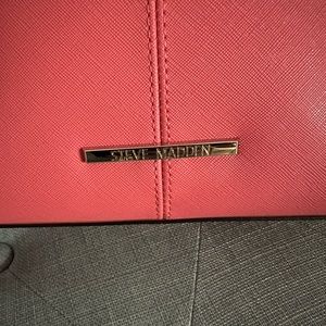 Pink Steve Madden tote.